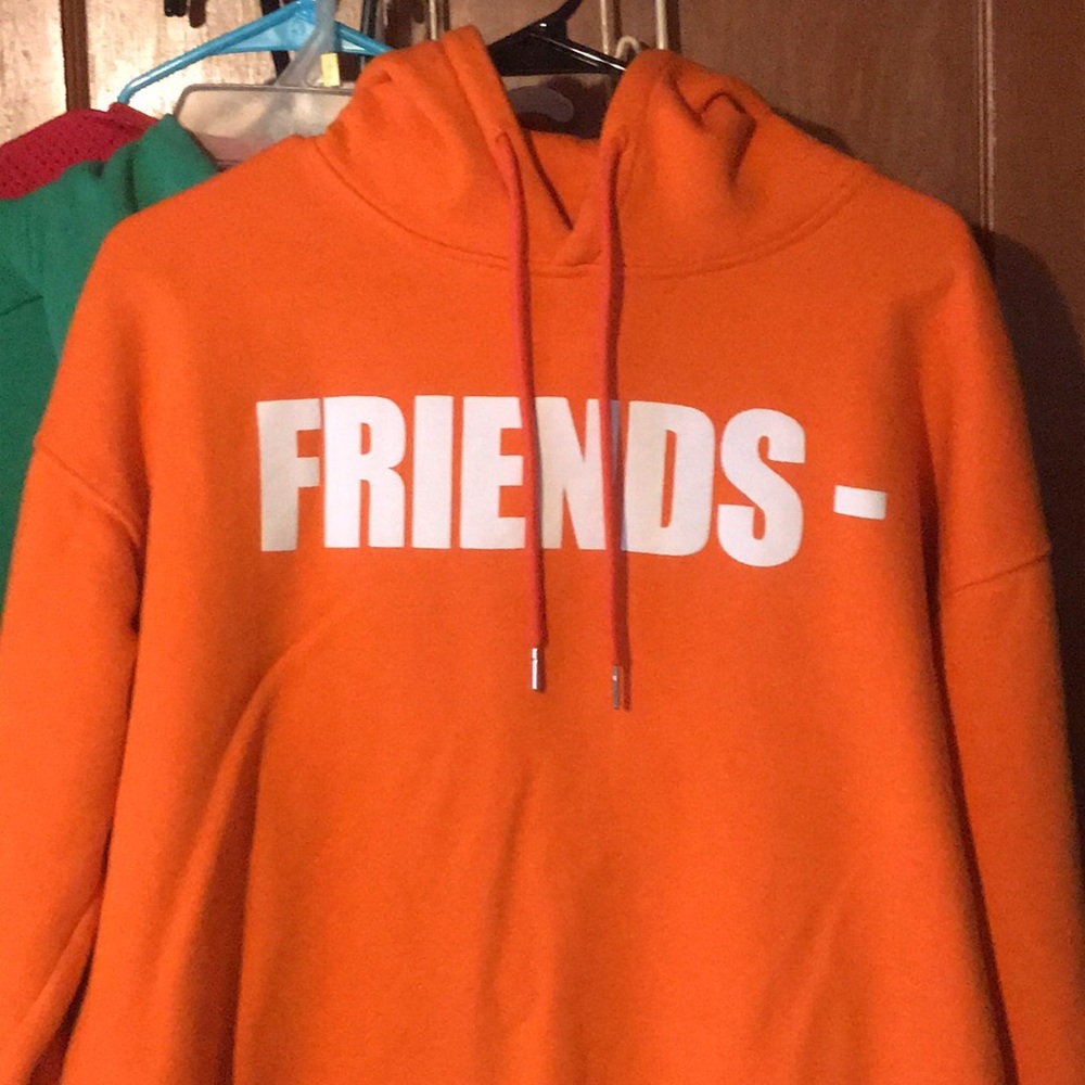 Orange Vlone hoodie.